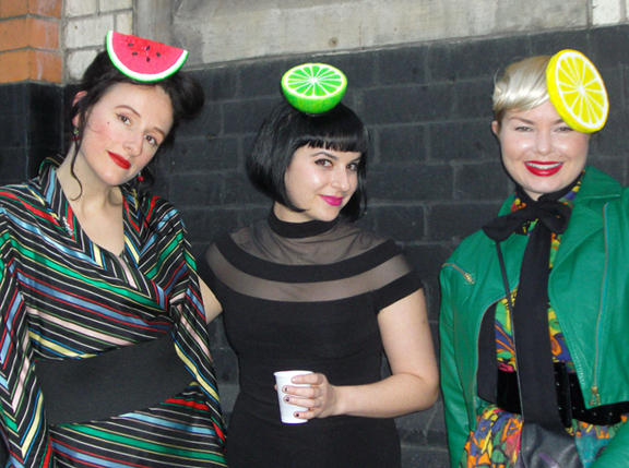 Staff wearing fruit hats