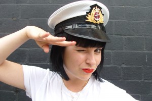 Sarah Jane wears a sailor cap to the festivals!